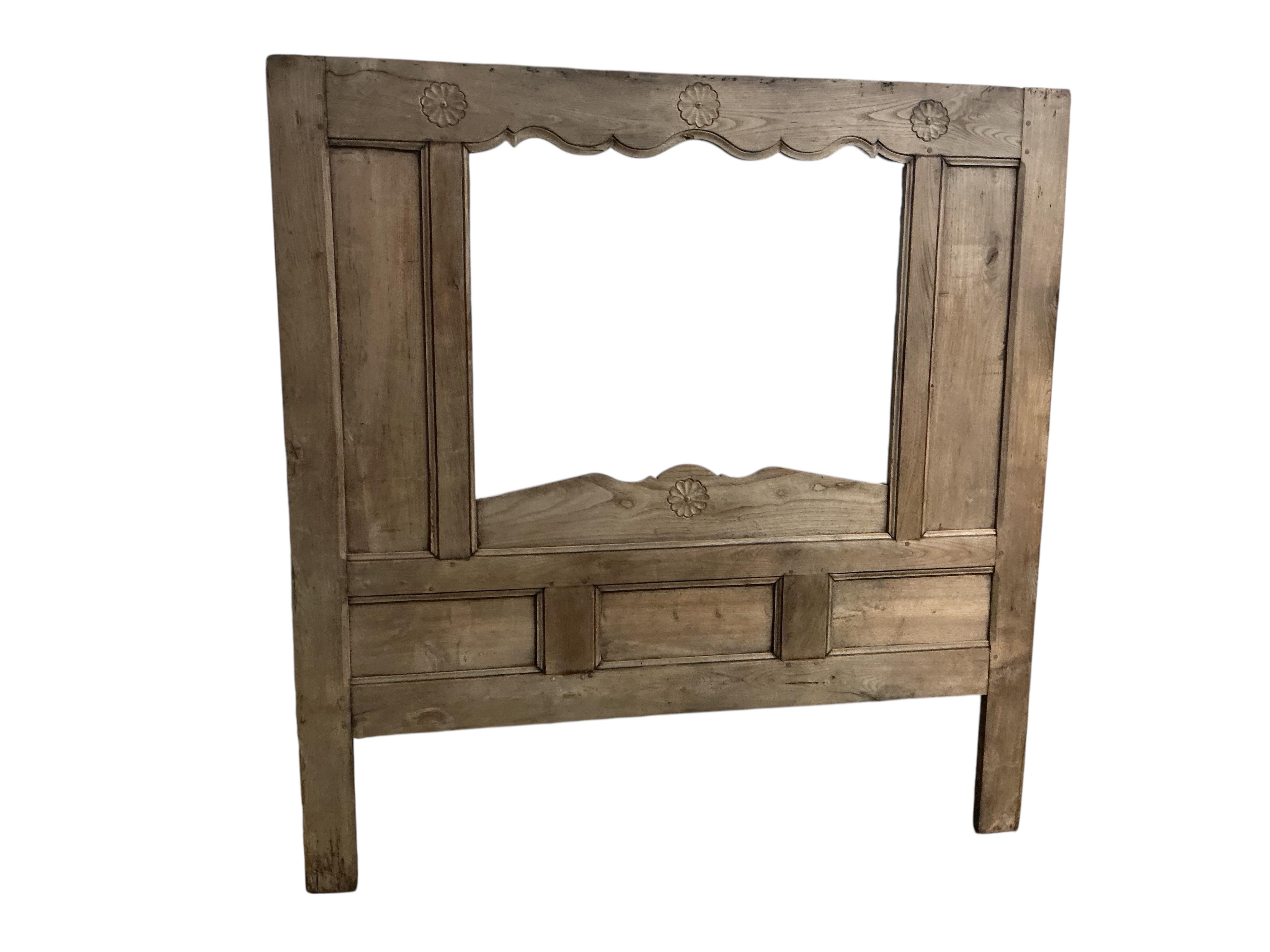 A 19th century oak truckle bed, width 178cm, height 182cm